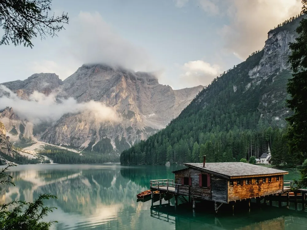 Timber cabin on a mountain lake