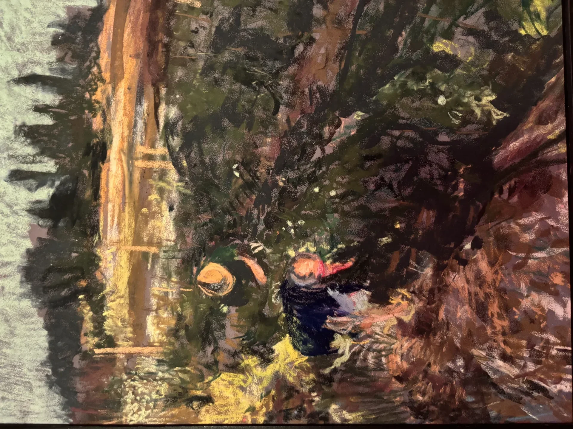 Pastel of two small figures among dark firs and a sunlit trunk, worked in deep greens and madrona red