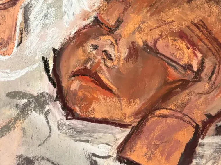 Close-up of the sleeping baby's face, built in warm orange and umber