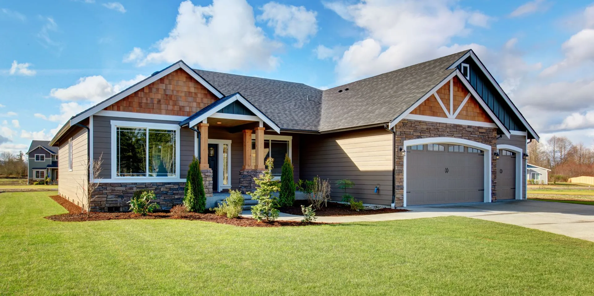 Craftsman-style home with a new dark architectural shingle roof