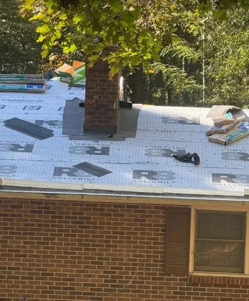 New underlayment installed on a brick ranch home