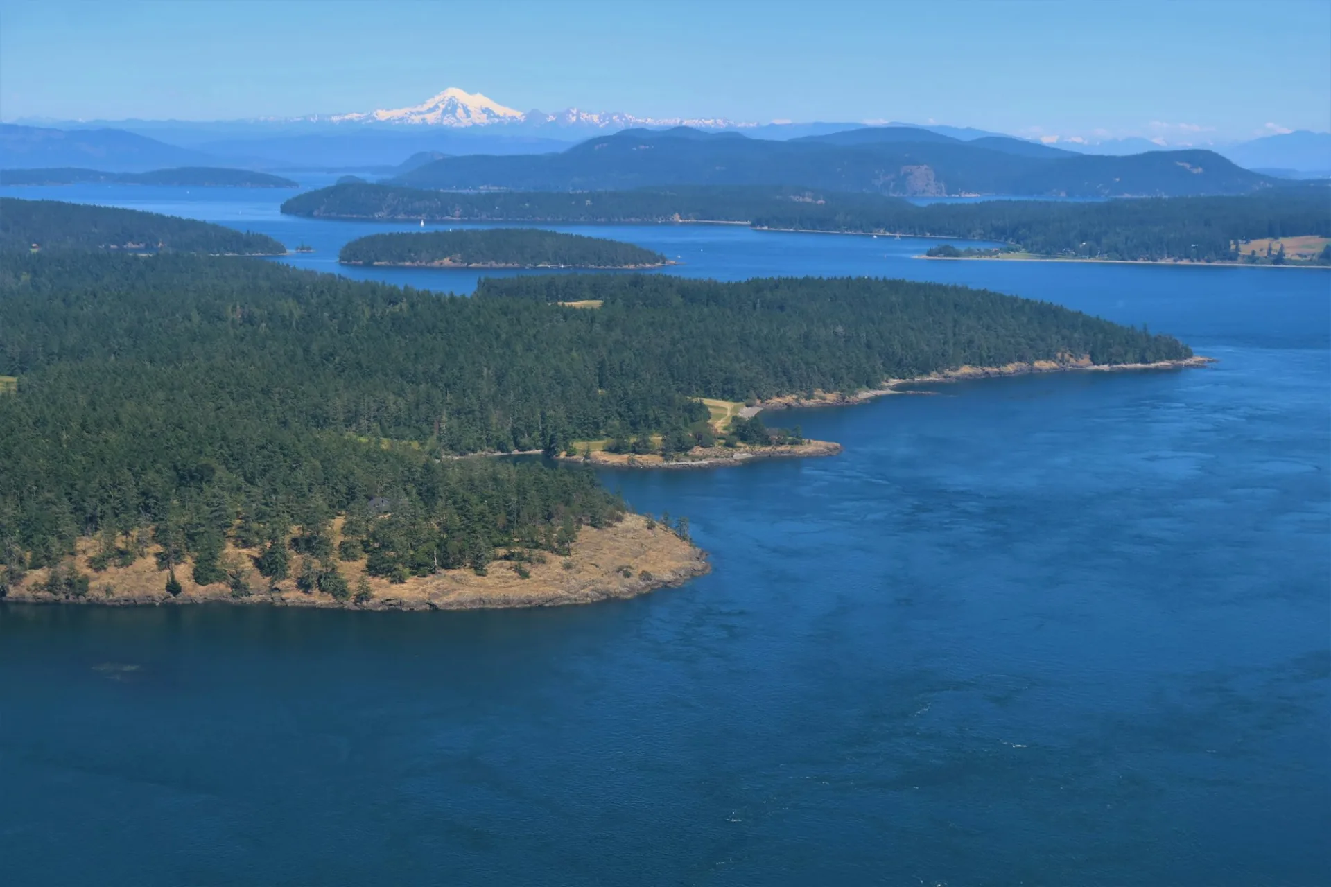 Wooded islands and blue water channels of the San Juan archipelago