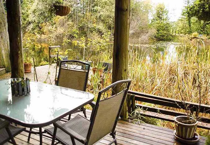 Covered deck overlooking the pond