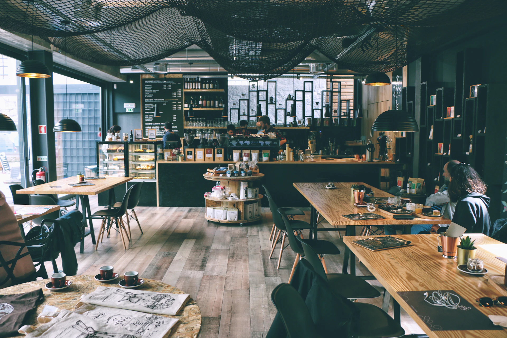 Cafe interior with warm wood and big windows